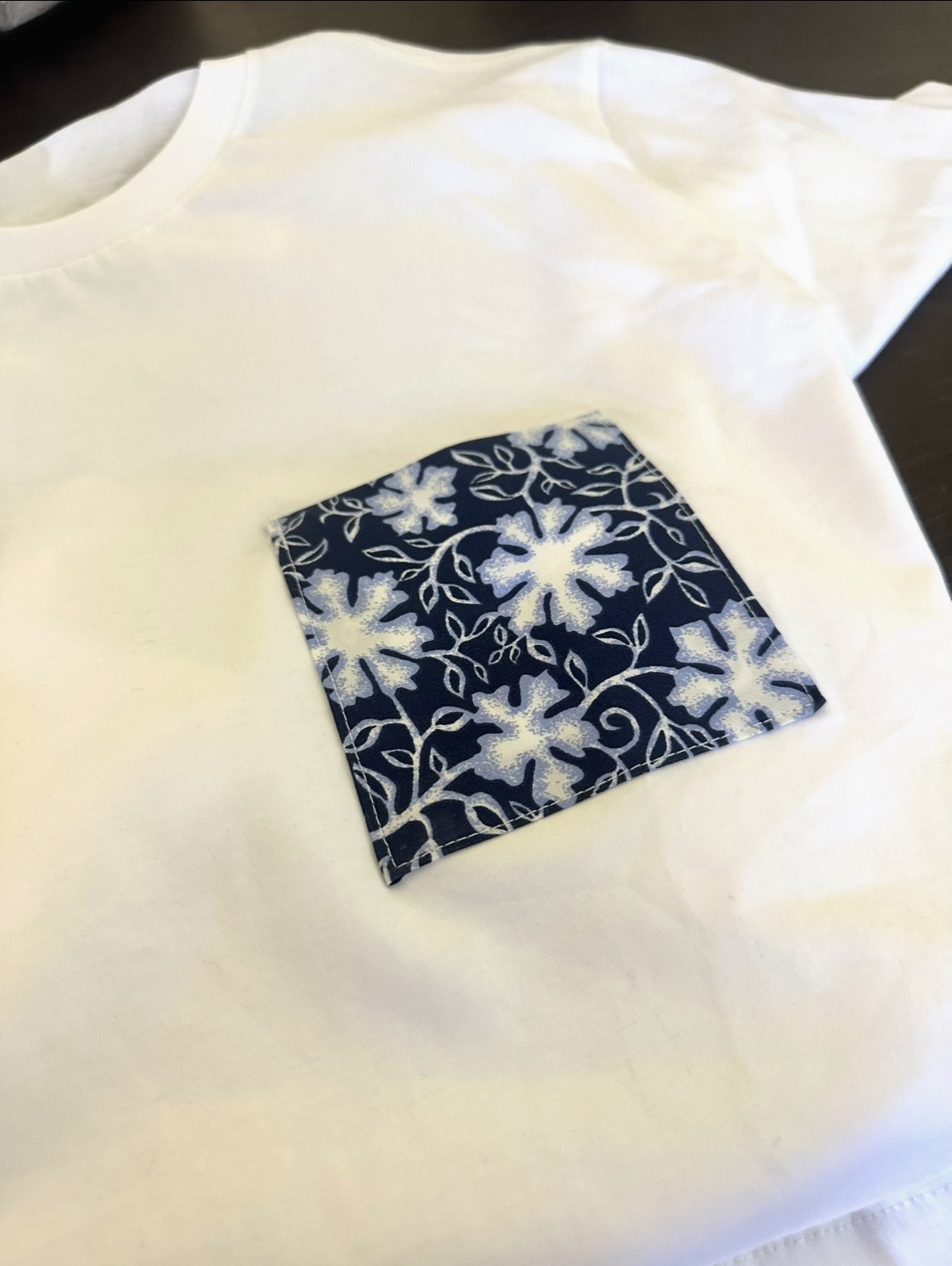 The Botanica in Navy pocket t-shirt